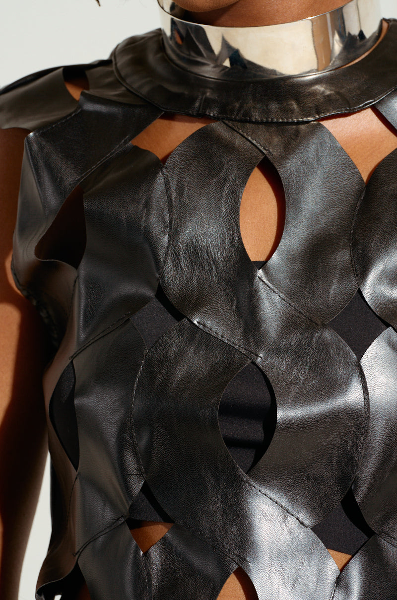ON MY OWN WAVE CUT OUT FAUX LEATHER TOP IN PU