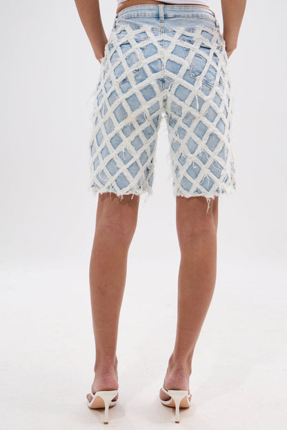 DISTRESSED AND STRESSED DENIM BERMUDA SHORT