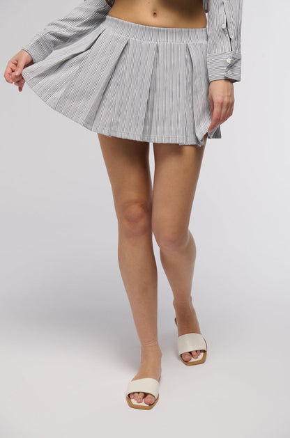 LEAVE IT BETTER PLEATED MINI SKIRT