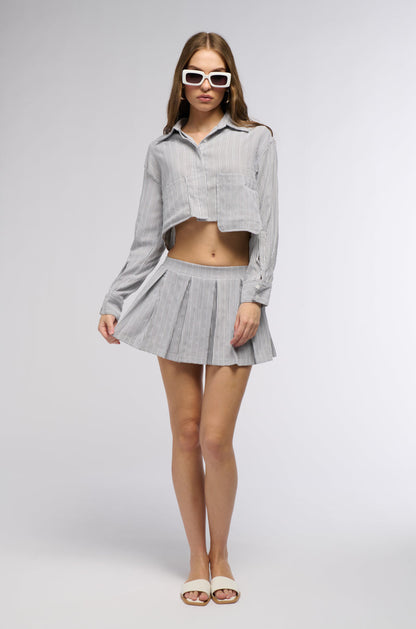 LEAVE IT BETTER PLEATED MINI SKIRT