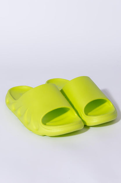 ONLY IN MY DREAMS FLAT SANDAL IN GREEN